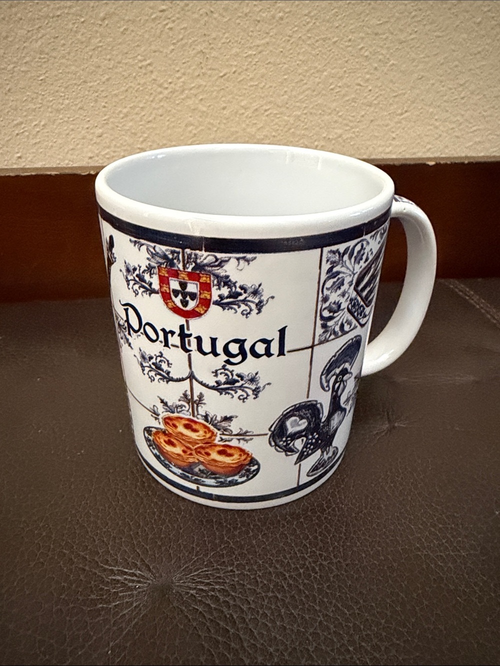 Portuguese Ceramic Mug Featuring an Azulejo Tile Pattern and Traditional Icons